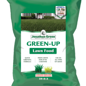 Dark Green plastic bag of Green up lawn Food from Jonathan Green. Product information listed in green text on a white background; Quick greening formula, feeds lawns for up to 3 months, use on any types of grass. There is a picture of a lush green lawn in front of a white house with red trim